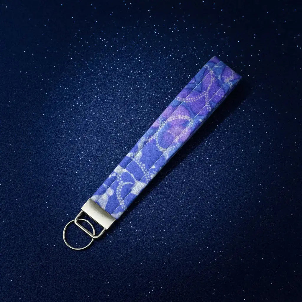 Keychain with a Purple  Butterfly pattern on a white background