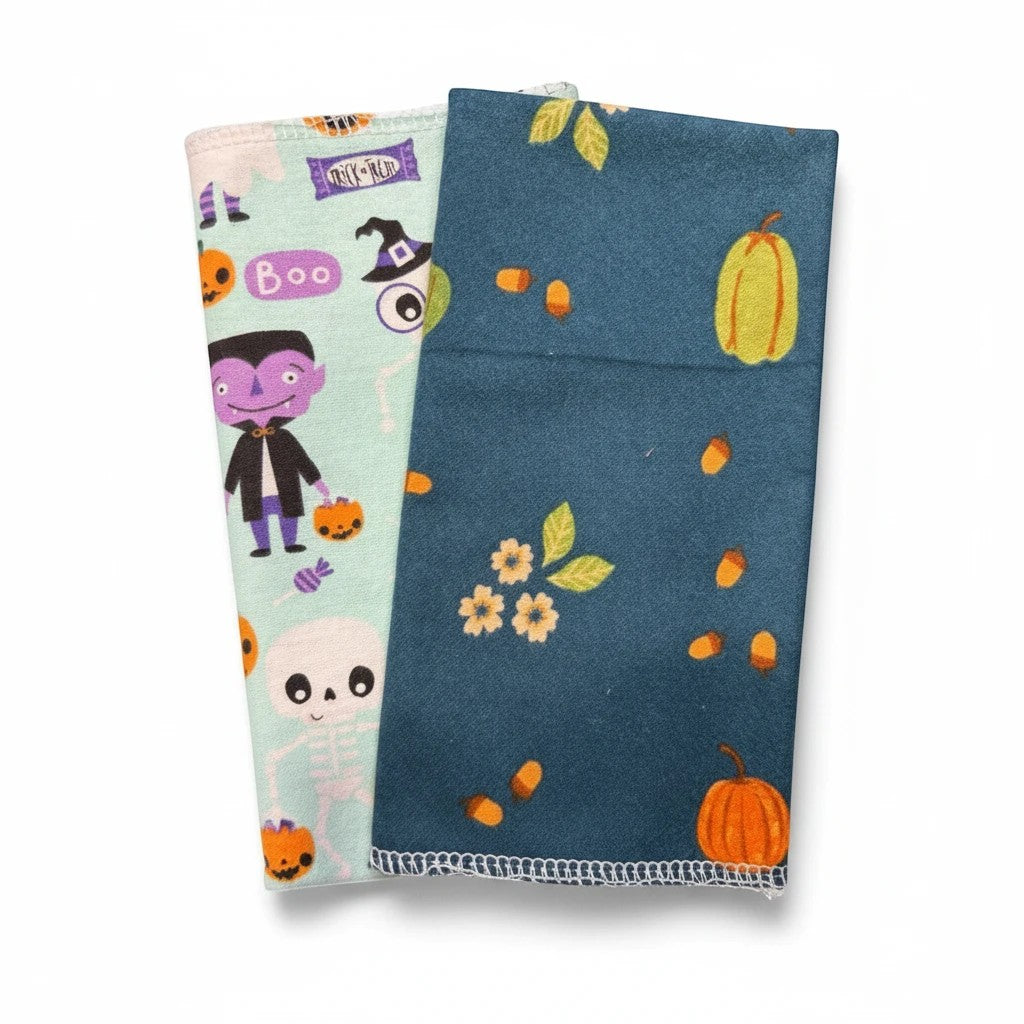 Crafts by Serenity seasonal kitchen towel set with Halloween ghost print and blue autumn pumpkin harvest pattern.